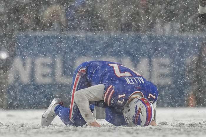 Buffalo Bills quarterback Josh Allen (17) remains down after a hard hit from Cincinnati Bengals cornerback Mike Hilton (21) in the fourth quarter of the NFL divisional playoff football game between the Cincinnati Bengals and the Buffalo Bills, Sunday, Jan. 22, 2023, at Highmark Stadium in Orchard Park, N.Y.